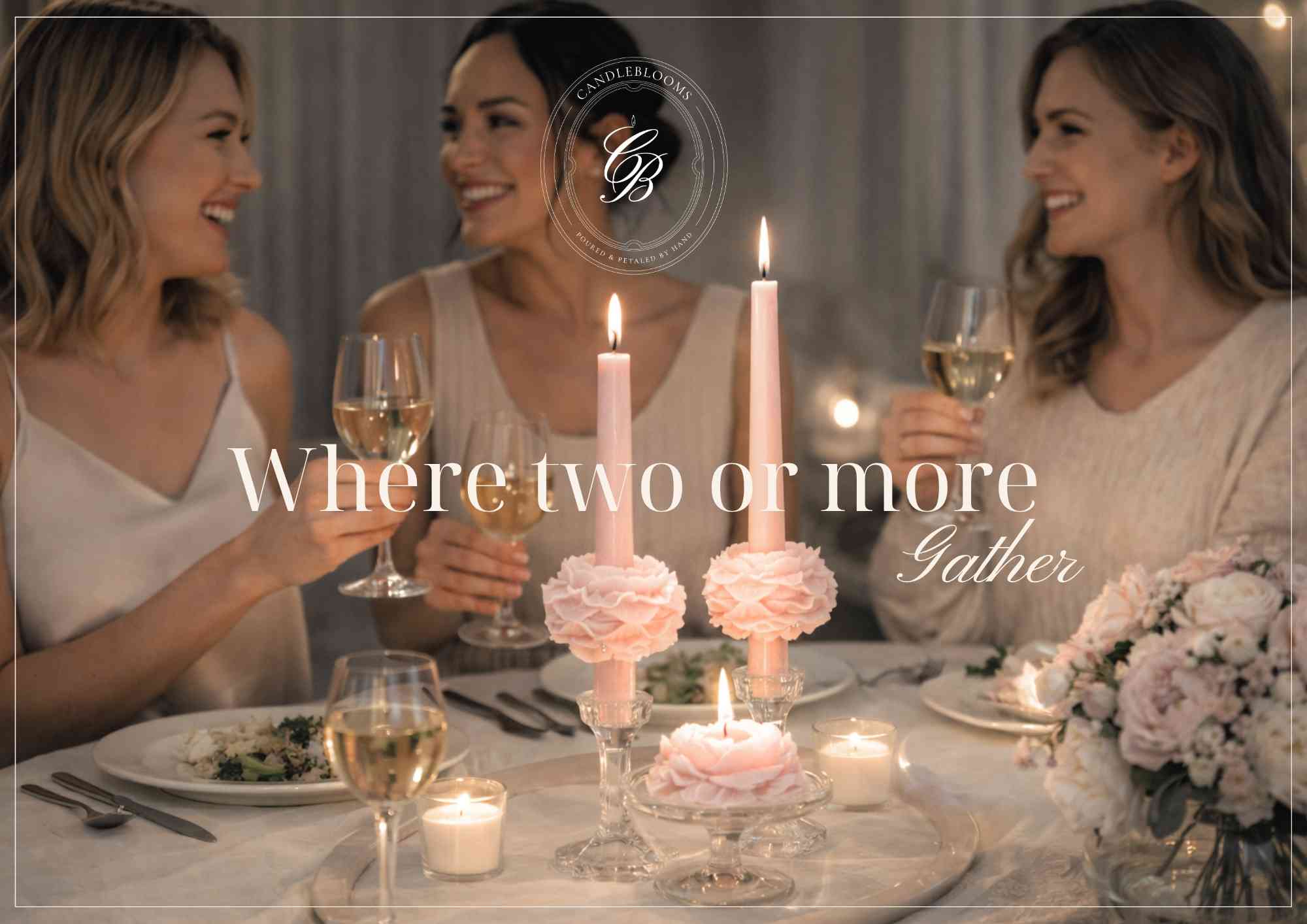 Women gathered around a candlelit table with pink CandleBlooms TableBlooms tapers